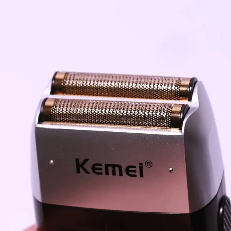 Kemei electric shaver for men with dual foil heads, silver body and copper foils