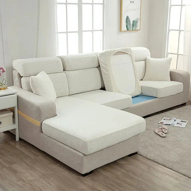 Sofa seat cover by Simples Market in solid light gray, thickened elastic dustproof protector for sectional cushions.