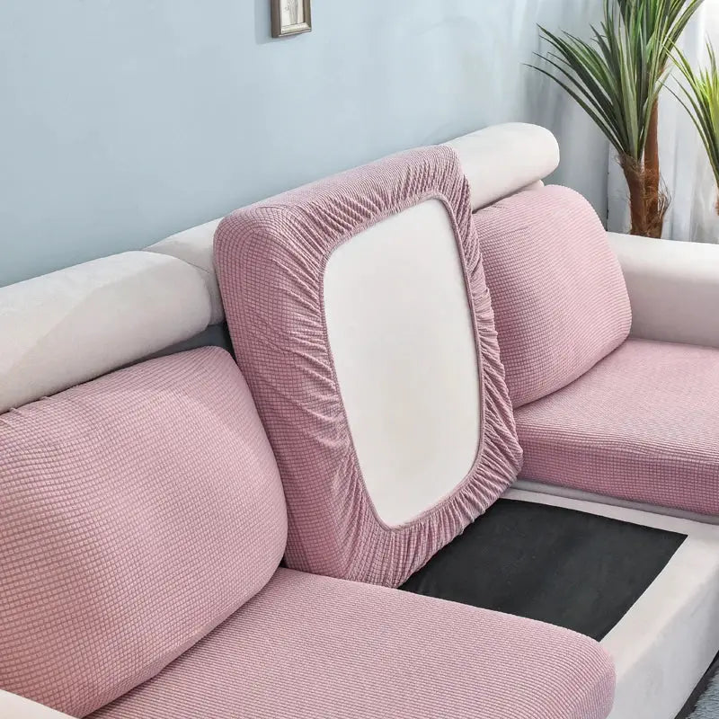 Sofa seat cushion cover in pink quilted fabric by Simples Market; removable, washable slipcover for pets and kids.