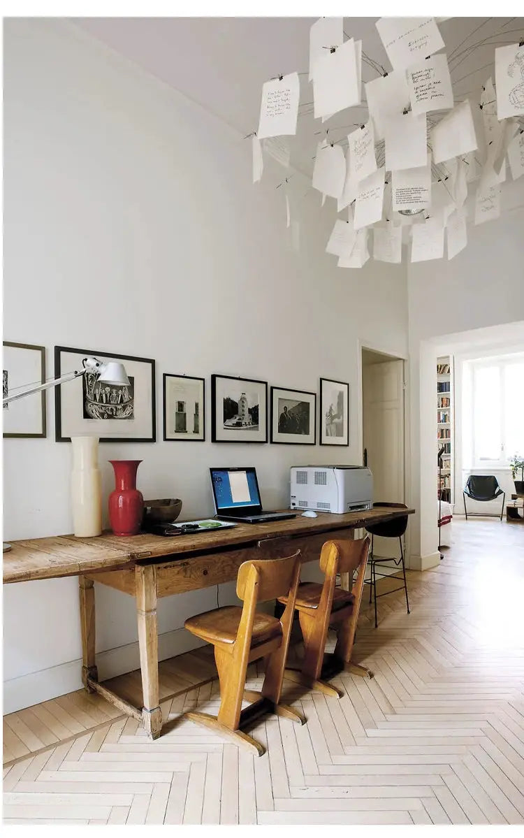 Ingo Maurer replica paper chandelier LED E27 lamp over a rustic wooden desk in a bright home office