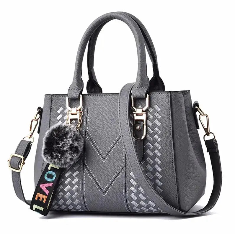 NovaLuxe PU Leather Messenger Bag For Women With Fur Ball Accent And Secure Zipper Closure