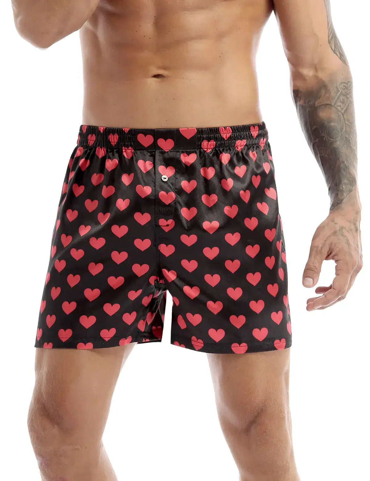 Men's heart-print boxer shorts, black with red hearts, lightweight beachwear.