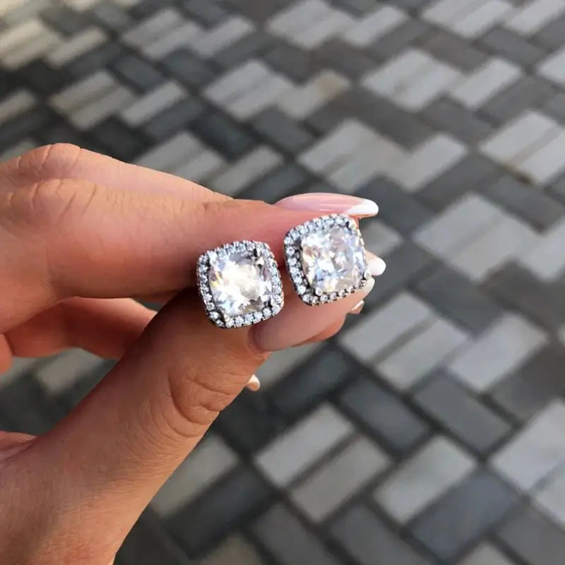 Pair of Huitan cushion-cut cubic zirconia stud earrings with halo, silver-tone setting