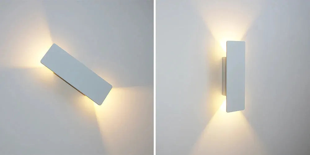 Modern white aluminum LED wall lamp for indoor use; uplight and downlight in a sleek rectangular bar.