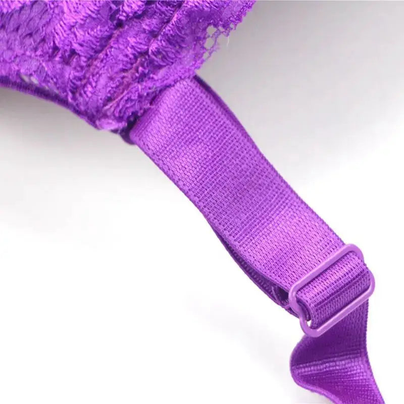 Purple lace push-up bra with adjustable strap and floral detailing