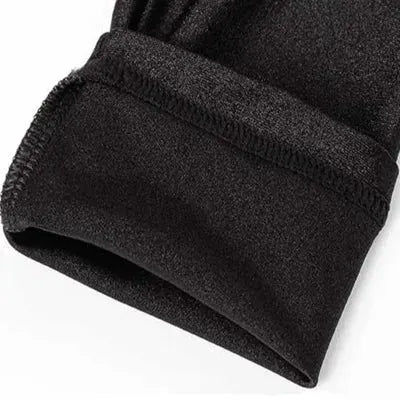 Leggings close-up in black fabric with stretchy knit and neat hem.