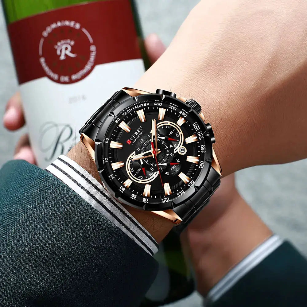 Men's Curren chronograph watch with stainless steel band, large black dial, luminous hands.