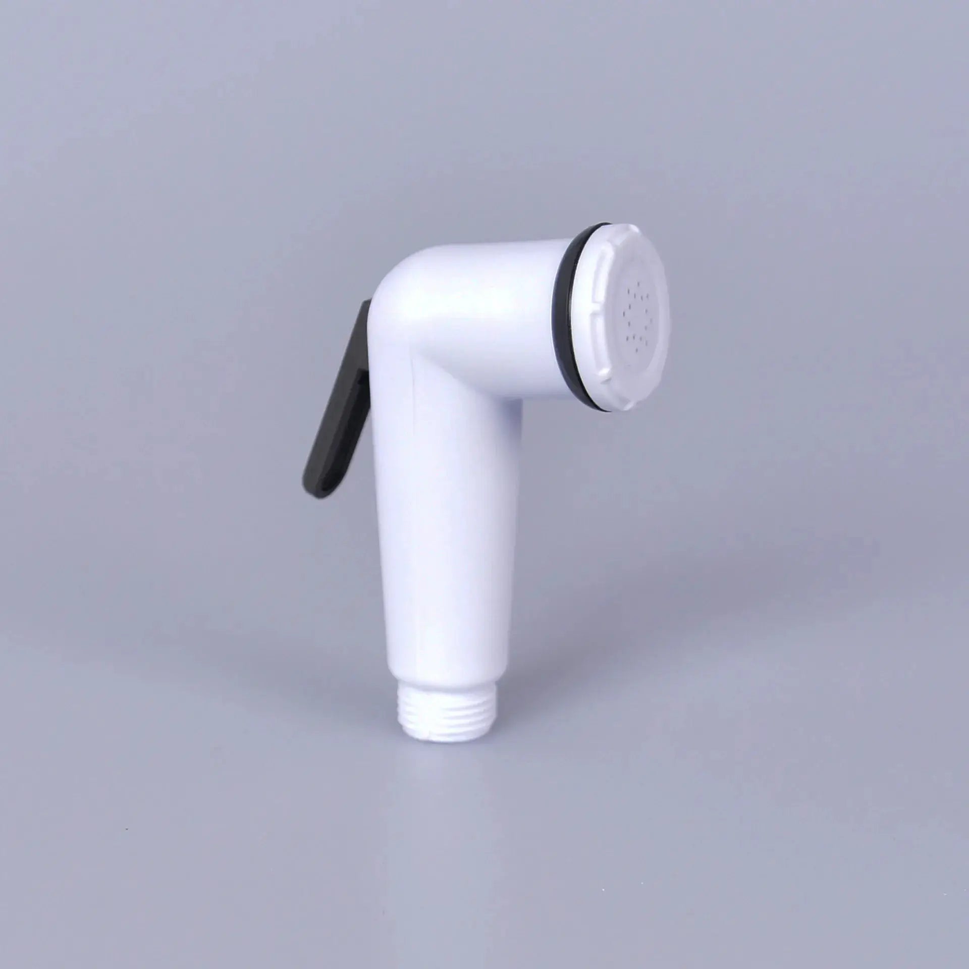 Handheld toilet bidet faucet head in white ABS plastic with black ring and threaded hose connection