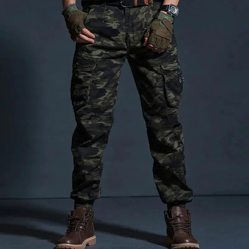 Men's camouflage cargo joggers with multiple pockets and tapered cuffs