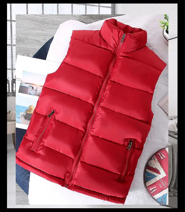Bright red men's sleeveless puffer vest with stand collar, front zip and zip pockets.