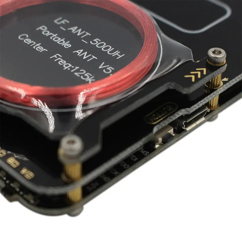 Proxmark3 RFID card reader/writer module with red circular antenna on black PCB