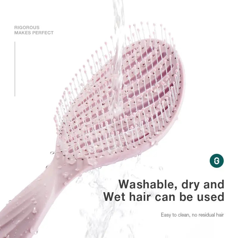 MR.GREEN pink hollow-out hair brush with scalp-massage bristles for wet and dry detangling by Simples Market