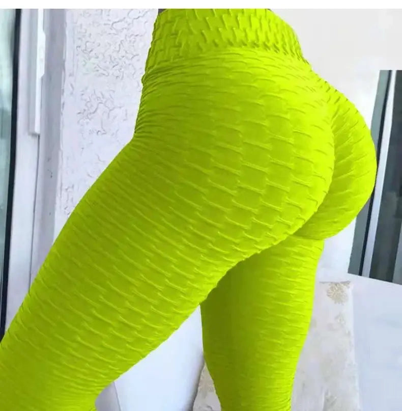 Push Up Leggings for women in neon lime green textured fabric with high-waist gym tights.