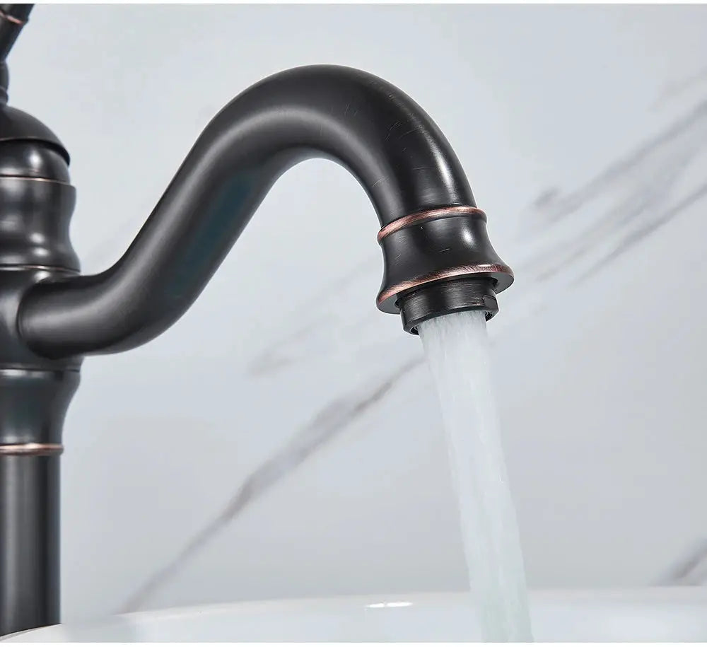 POIQIHY antique brass basin vessel sink faucet; Simples Market deck-mounted single-hole gooseneck with copper accents.