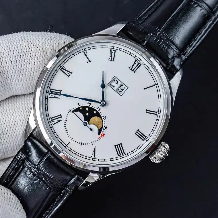 Sugess Tianjin ST25 automatic men's wristwatch with white dial, moonphase, date window, blue hands, black leather strap.