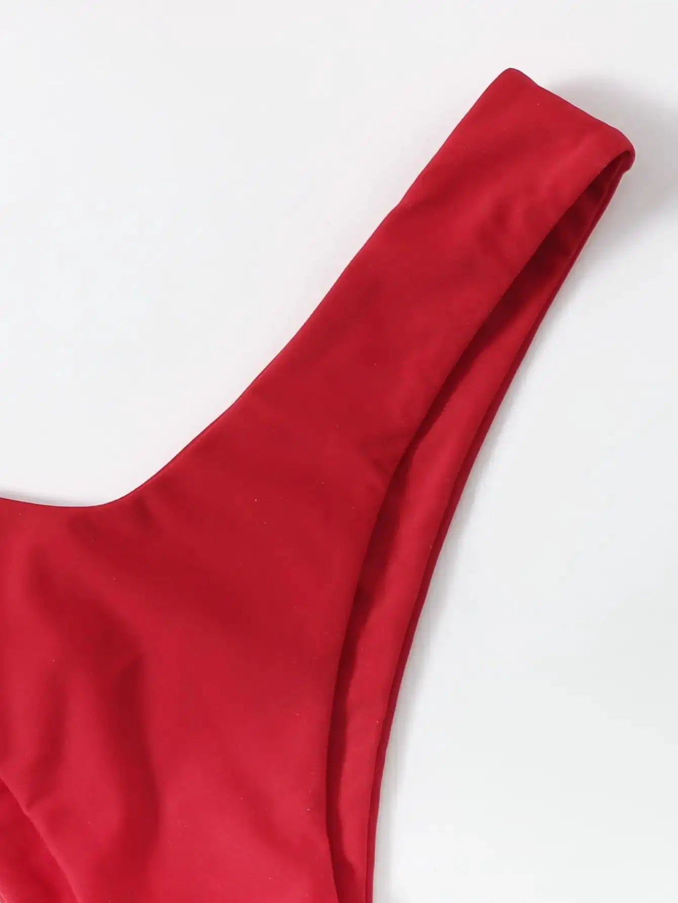 ZTVitality red solid tie bikini top folded on white background