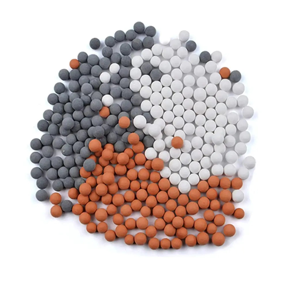 Simples Market shower head filter beads set in grey, white, and orange ceramic balls for water purification