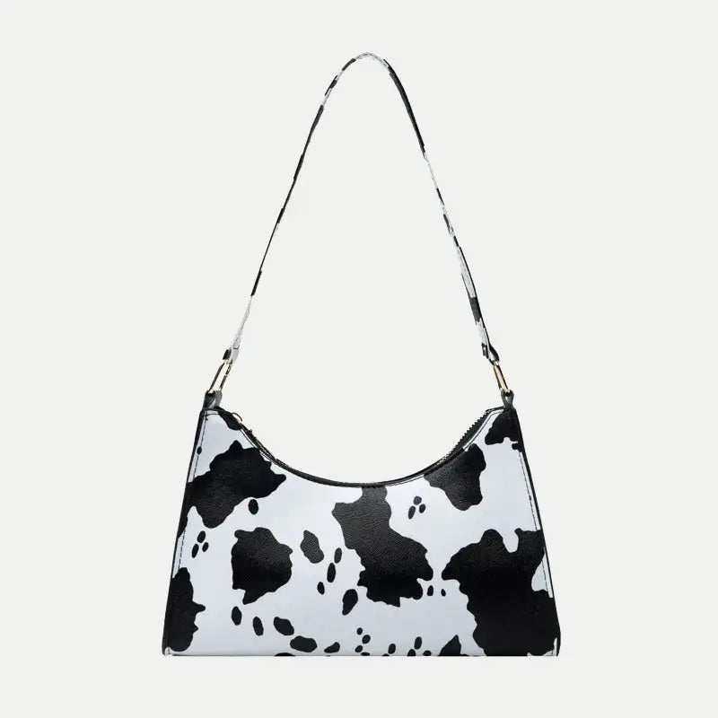 Shoulder bag in black-and-white zebra print, PU leather finish.