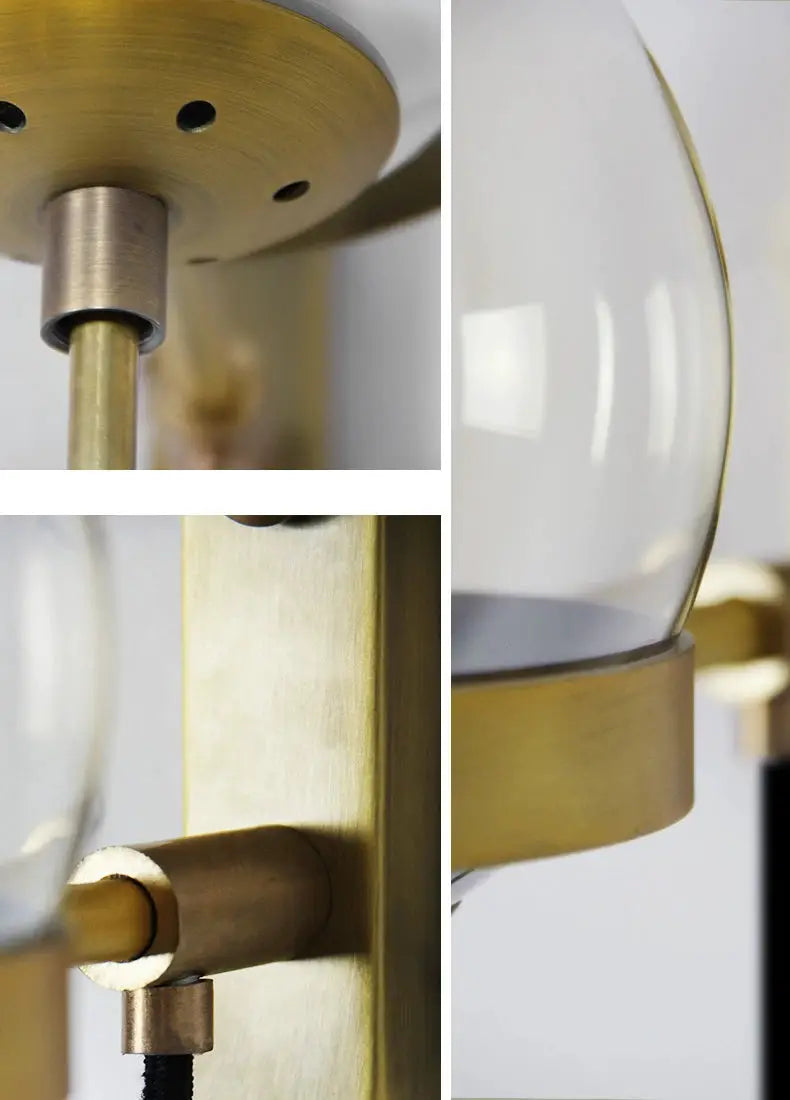 Modern glass ball wall lamp by Simples Market; brass finish with clear glass globe and E27 socket.