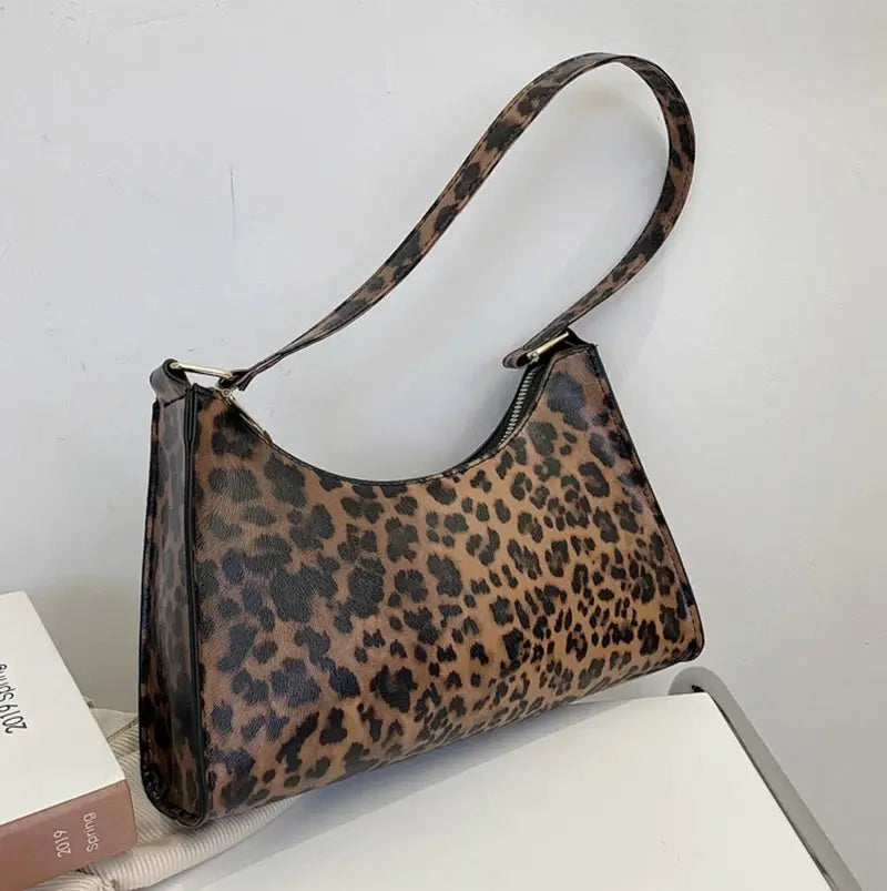 Leopard print PU leather shoulder bag for women with top zipper and single strap