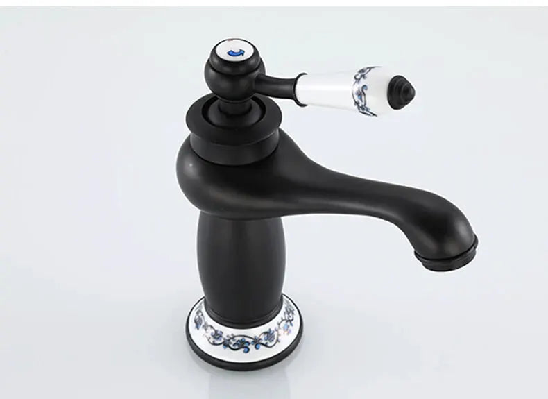 Bathroom faucet Simples Market, antique bronze finish brass basin tap with single handle and ceramic decorative base