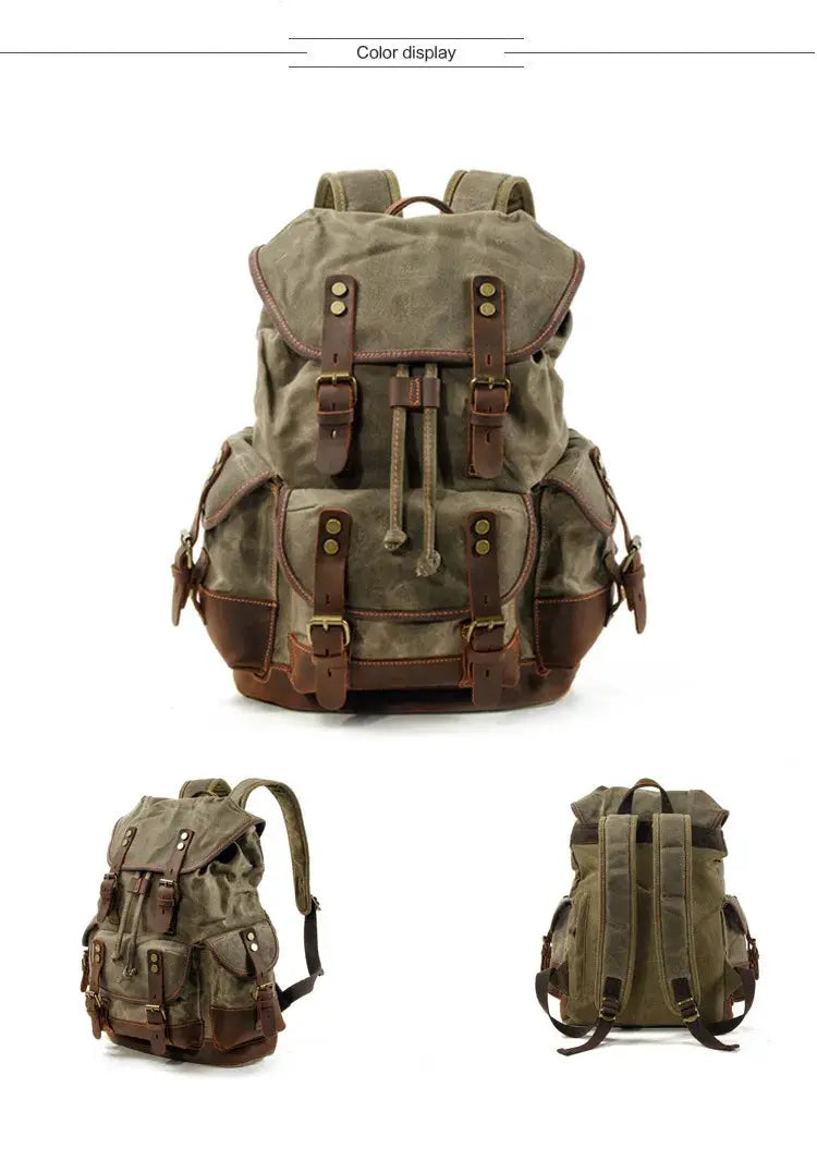 Vintage canvas backpack with brown leather straps and brass hardware; olive waxed finish, large travel daypack with pockets.