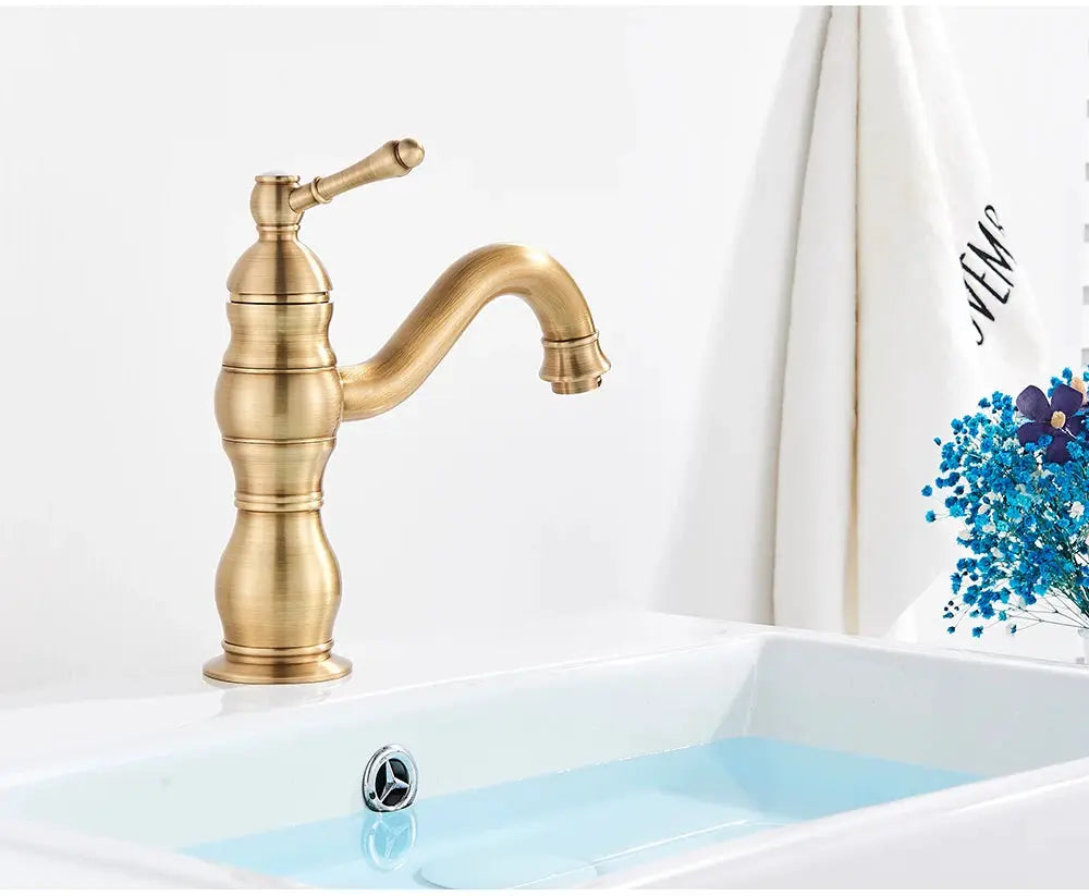 Antique brass basin faucet, deck-mounted single-hole, hot and cold mixer tap for bathroom.