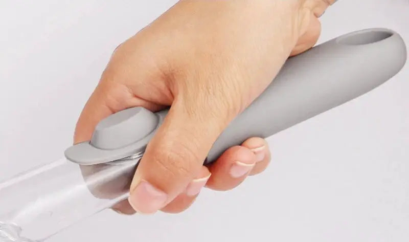 Refillable liquid cleaning brush with long gray handle for kitchen bowls and dishes