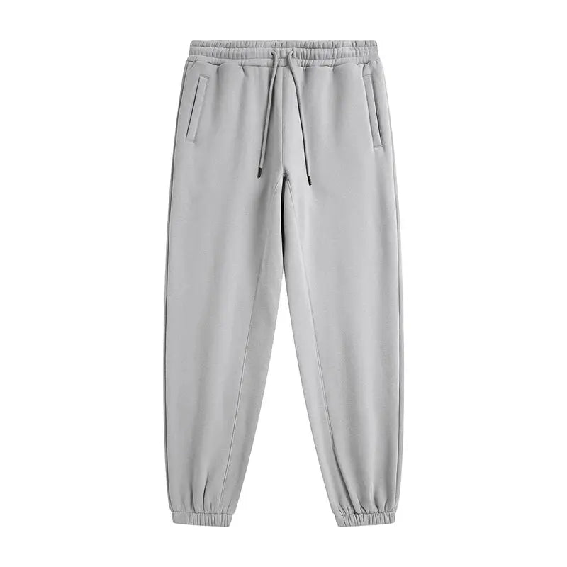 ZODF Trendy fleece sweatpants, gray unisex joggers with drawstring, side pockets and cuffed ankles.