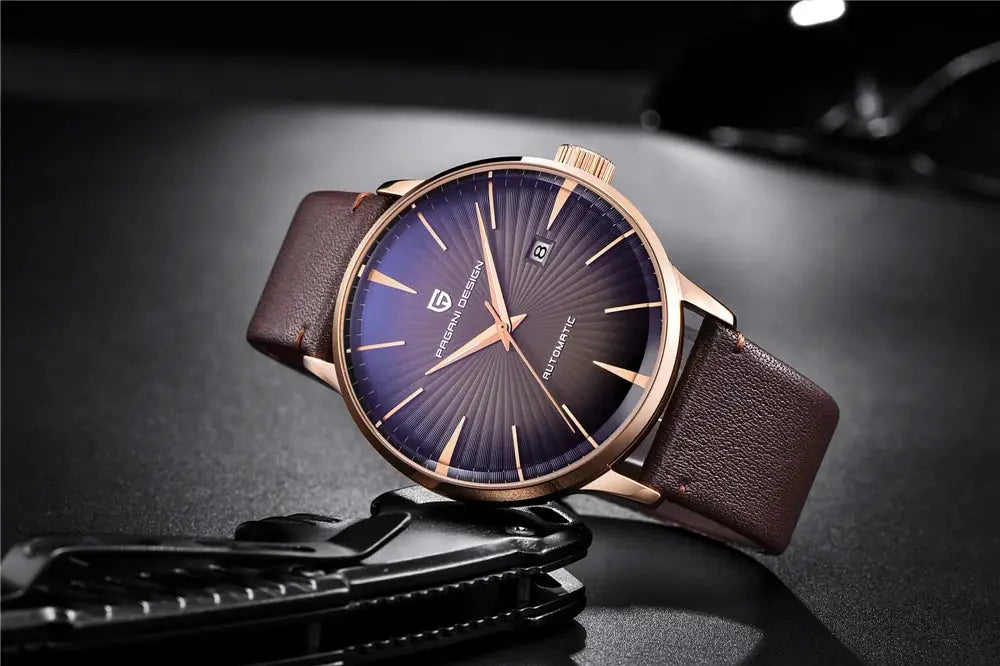 Pagani Design men's automatic watch with blue sunburst dial, gold-tone case, brown leather strap.