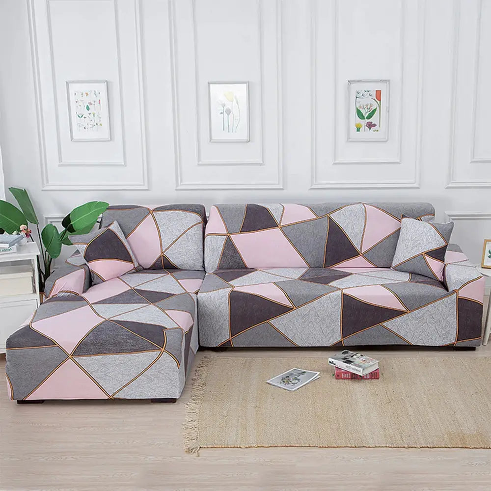 Sofa slipcover, stretch geometric-print for L-shaped living room corner sofa in pink and gray.