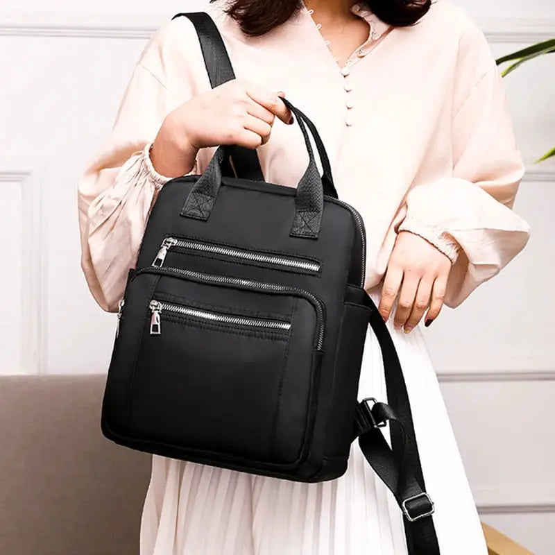 Backpack Simples Market black Oxford with multiple zip pockets; waterproof, large capacity casual school bag