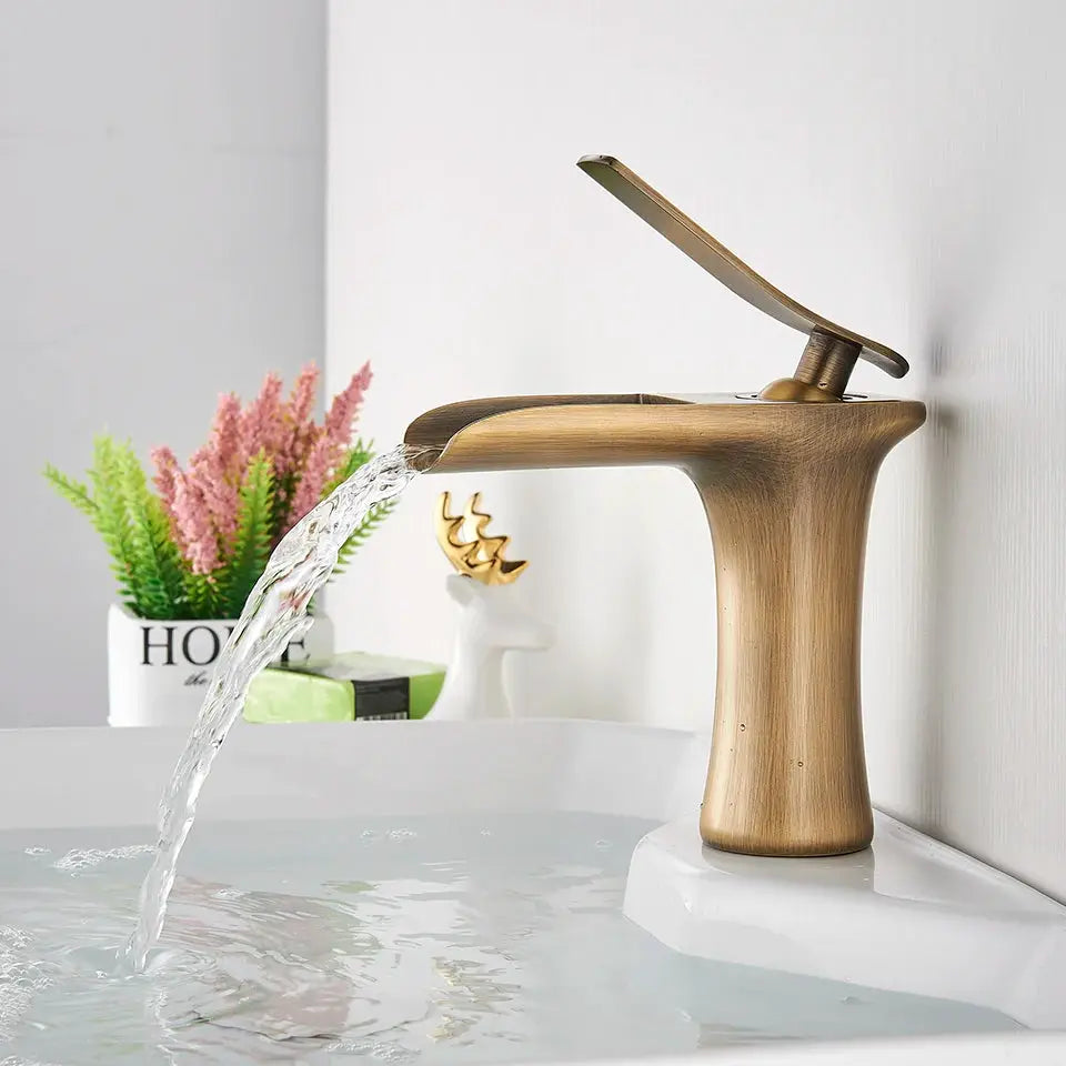 Simples Market basin faucet, antique brass waterfall style with single lever for sink
