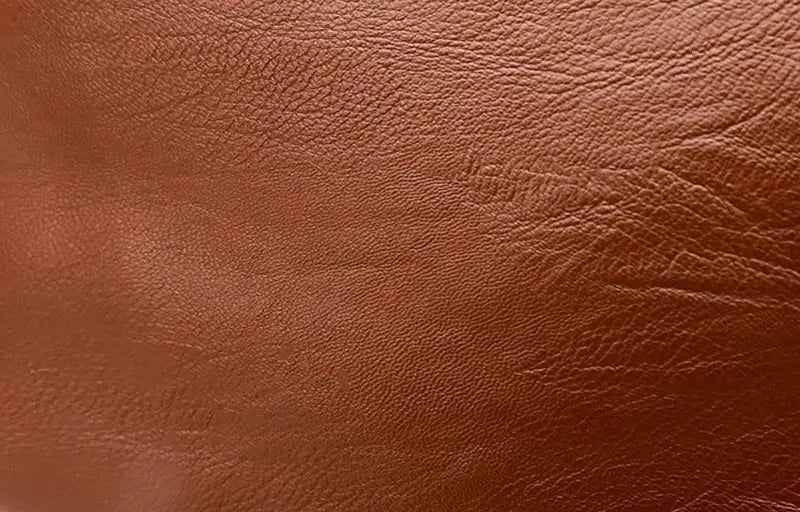 Women's messenger bag in brown PU leather with textured surface