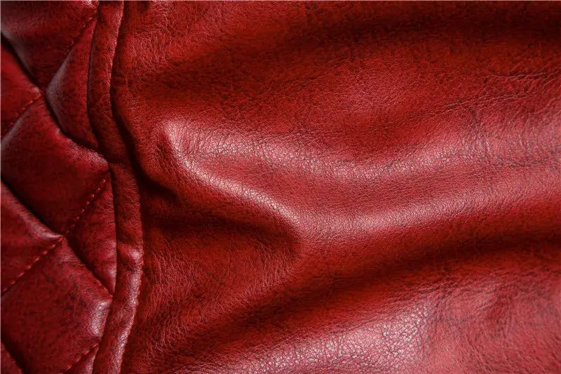 Leather motorcycle jacket in red with quilted panel detail