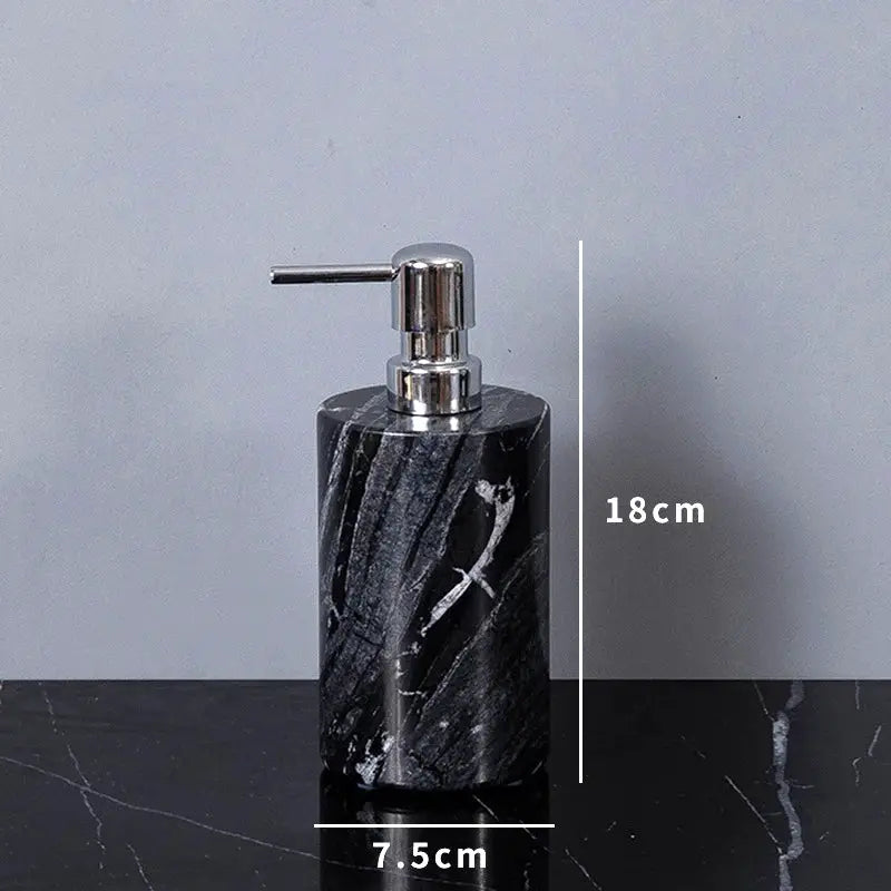 Soap dispenser by Simples Market in black marble with chrome pump, 18 cm tall.