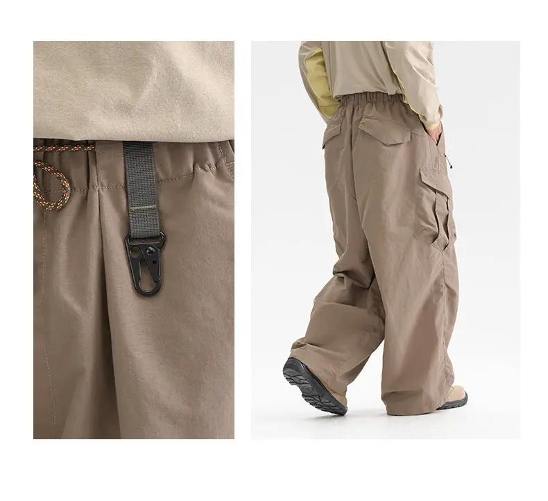 Ultra Loose Lightweight Outdoor Functional Pants in tan with cargo pockets, drawstring waist, wide-leg track trousers.