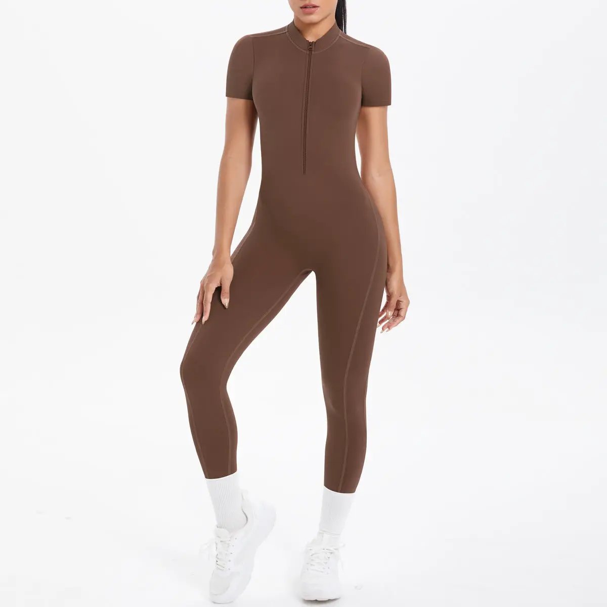 Simples Market brown bodycon jumpsuit with short sleeves and front zipper, full-length on model.