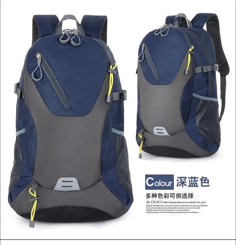 Classic 40L unisex outdoor backpack in navy blue and gray patchwork, waterproof travel bag with multiple zip pockets