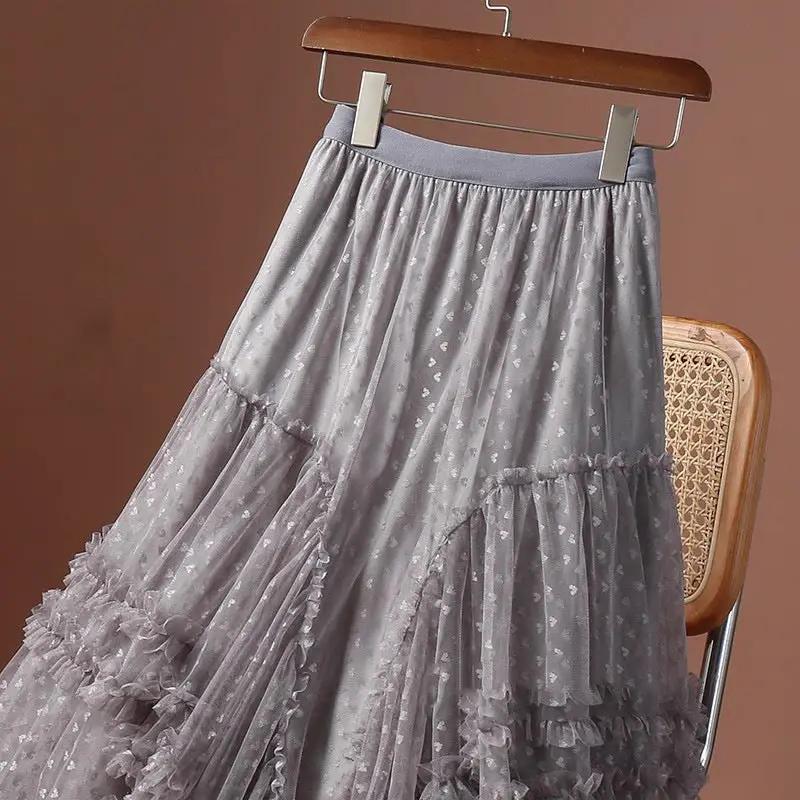 Women's long grey mesh heart-printed tulle skirt with elastic high waist and layered ruffles.