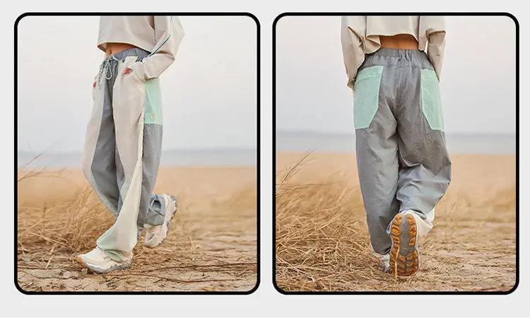 Men's lightweight quick-dry cargo track pants with ultra-loose wide-leg fit, grey with mint pockets; Simples Market.