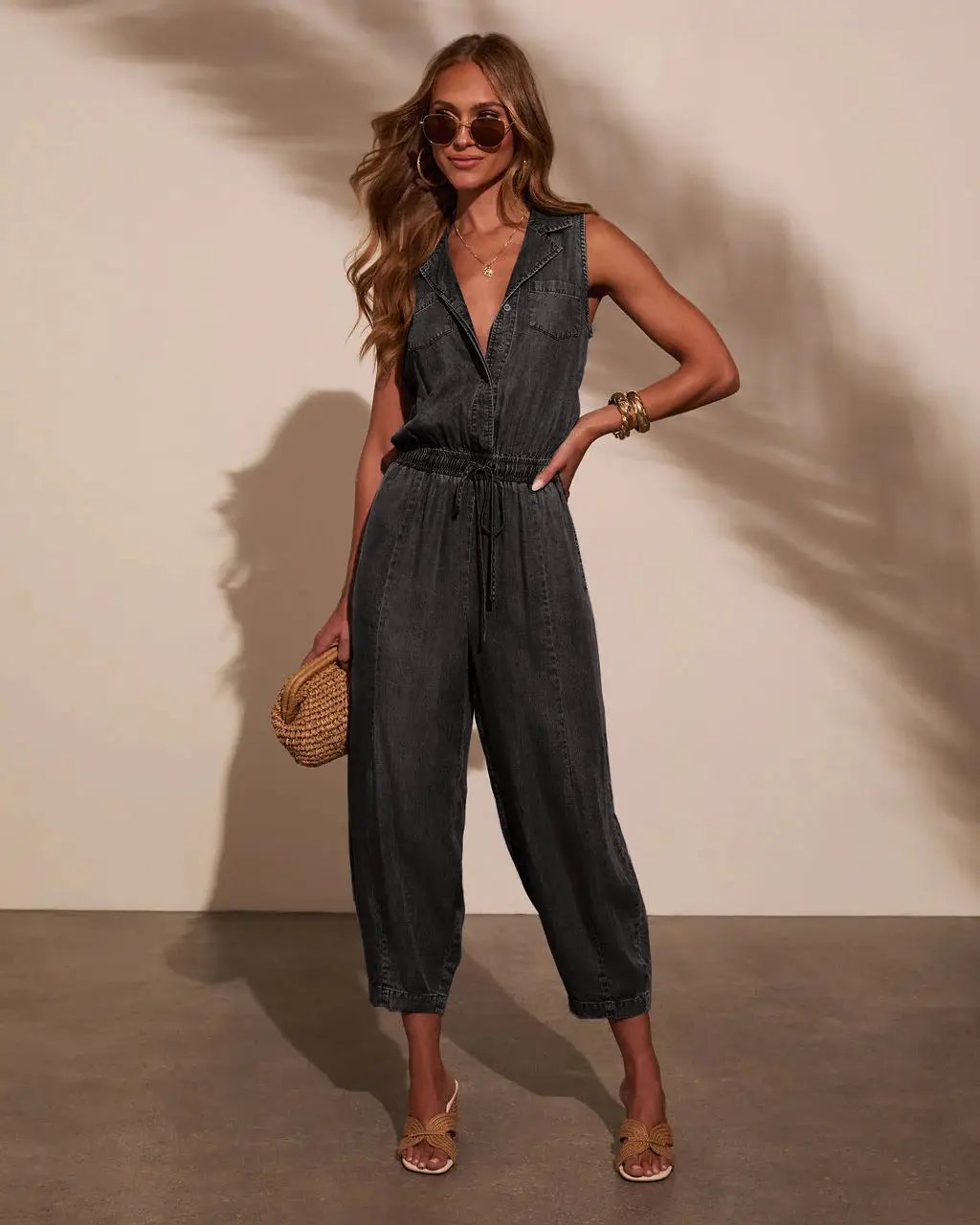 Simples Market women's sleeveless dark denim jumpsuit with drawstring waist and pockets