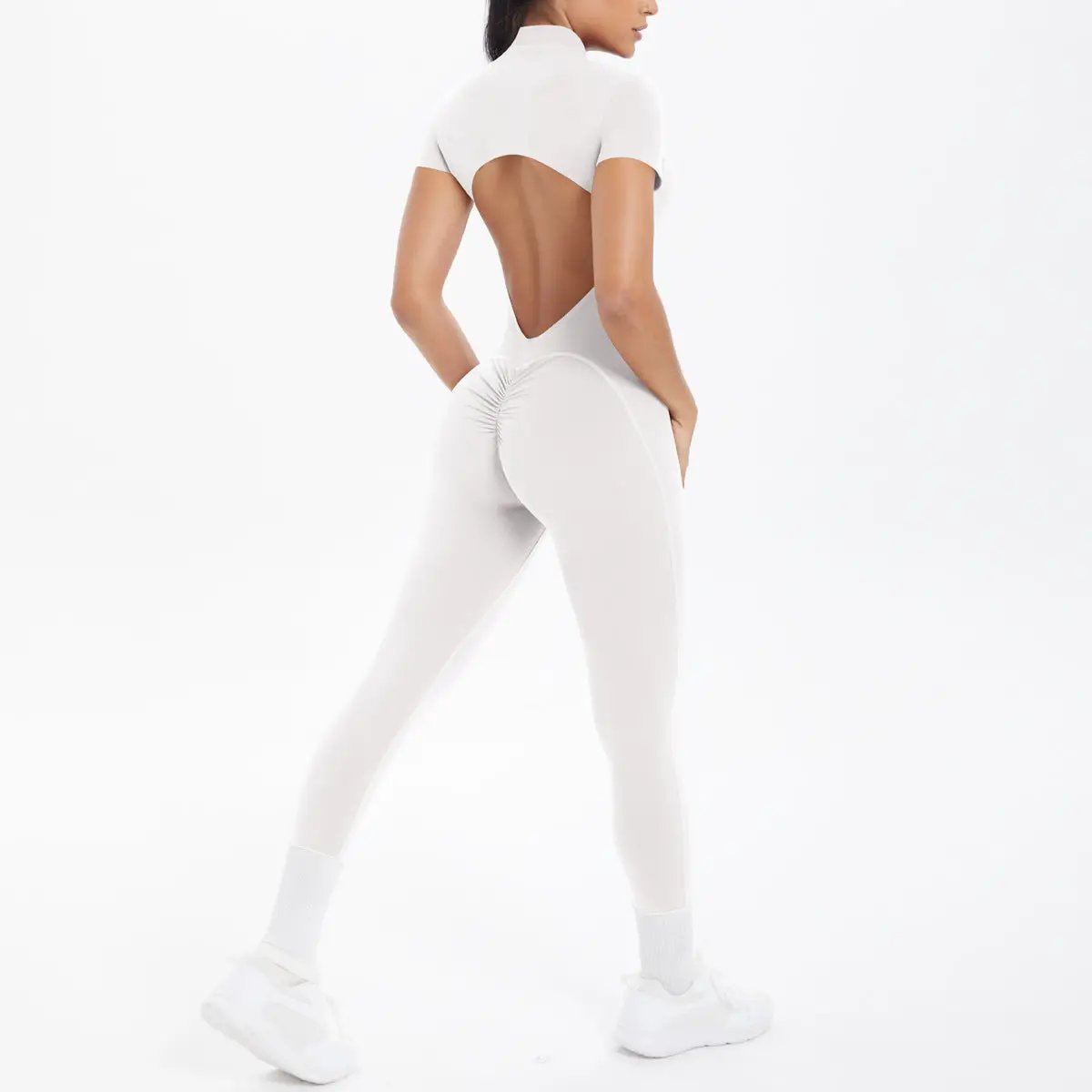 White backless bodycon scrunch jumpsuit for women with open-back design, ideal for dance fitness