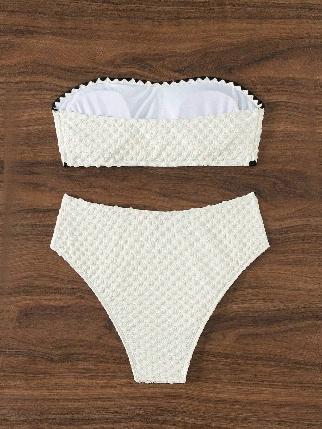 White textured two-piece strapless bikini set with bandeau top and matching bottoms