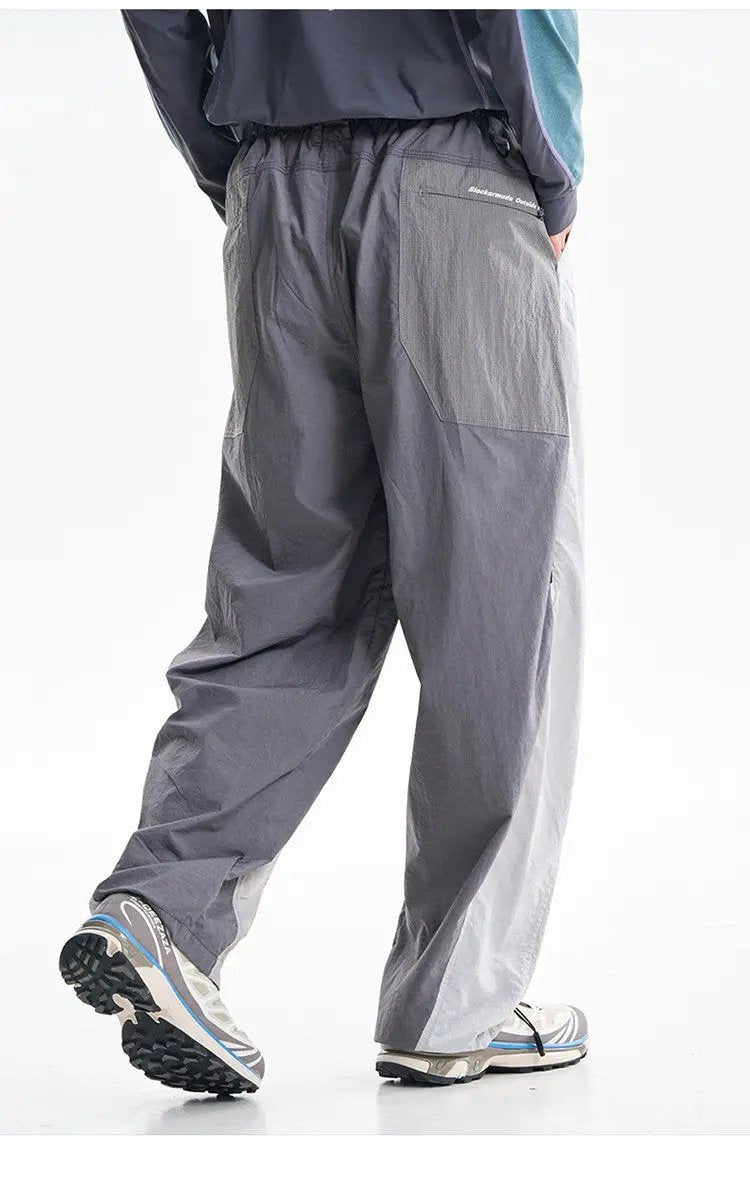 Men's cargo pants by Simples Market; ultralight quick-dry fabric, loose wide-leg with gray patchwork panels