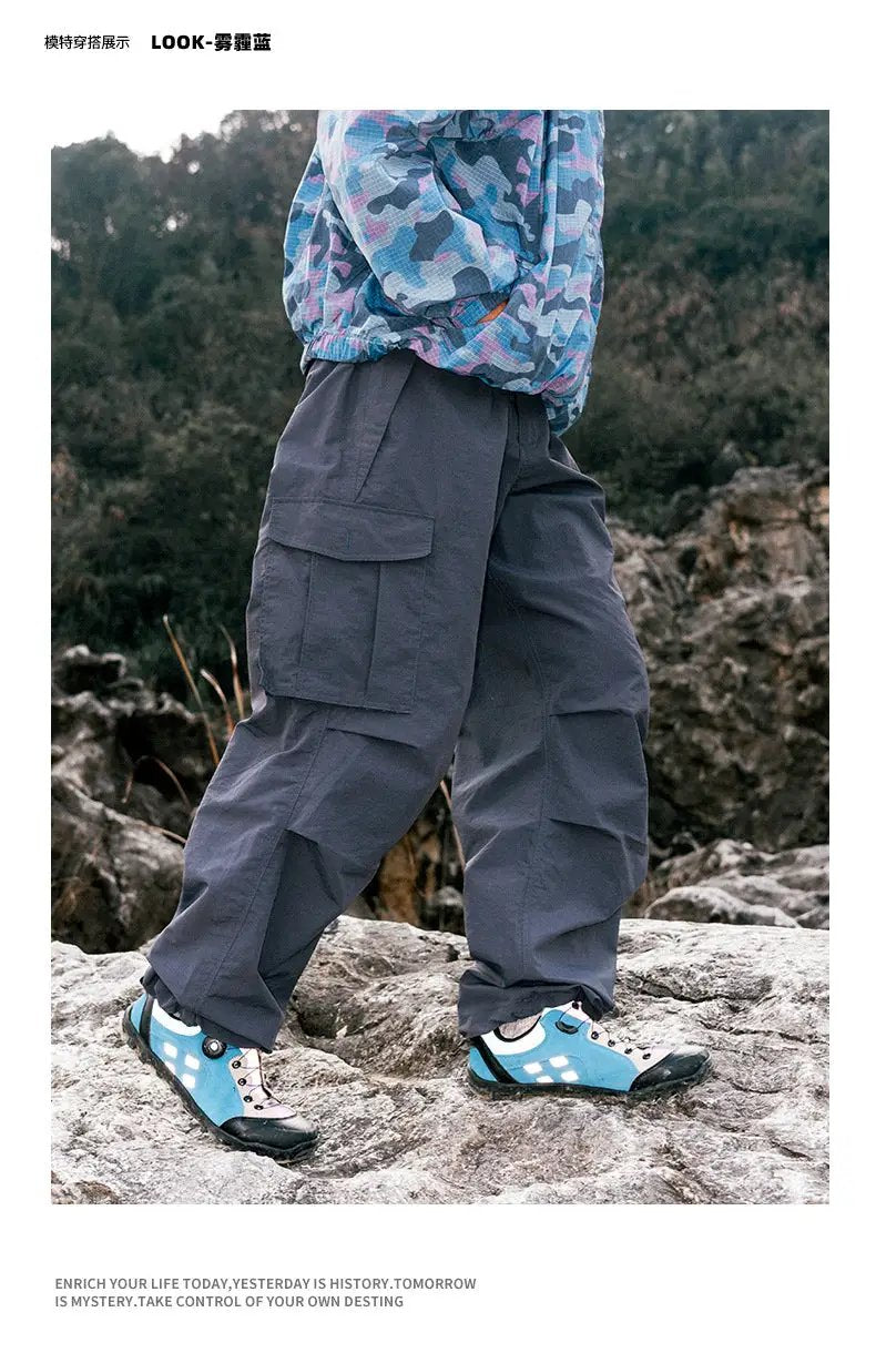 Simples Market loose outdoor cargo pants, dark gray wide-leg techwear with multiple pockets and waterproof fabric