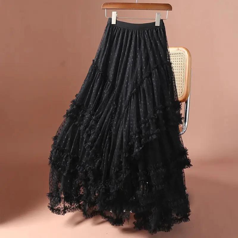 Maxi black mesh heart-printed tulle skirt by Simples Market with elastic high waist and layered ruffles