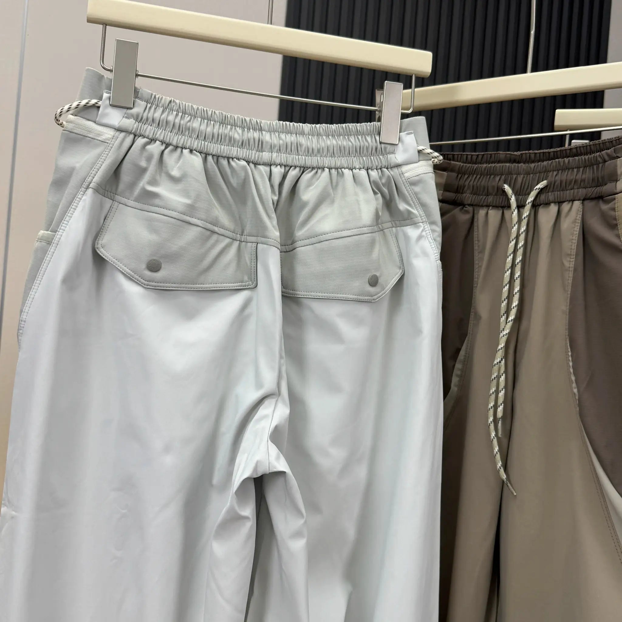 Two cargo shorts by Simples Market; light gray and taupe with elastic waist and cargo pockets