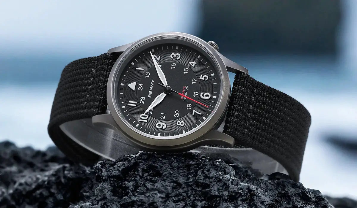 BERNY full-titanium men's field watch, black dial with luminous hands, white numerals, nylon strap.