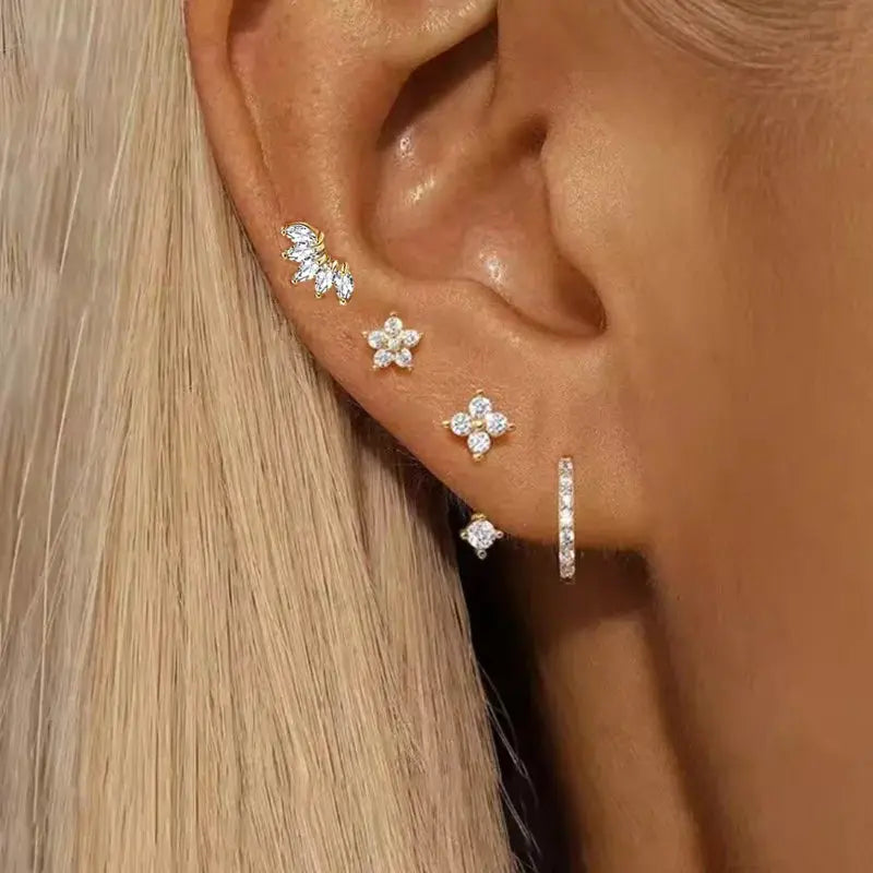 Simples Market 4-piece zircon earring set in gold-tone with flower studs and a small hoop